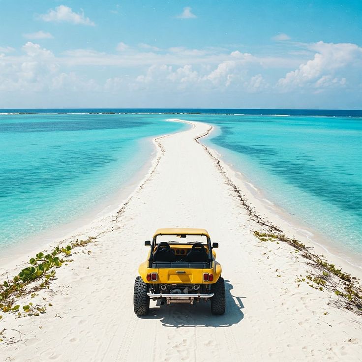 Scenic view of a 4x4 beach buggy driving along the coastline on a day trip from Búzios.